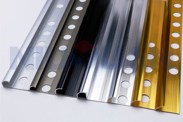 A selection of tile trims in various colors and finishes.