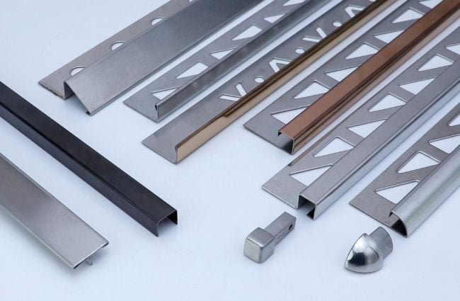 Aluminum and stainless steel tile trim profiles in silver, gold and black finishes