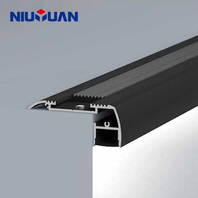 LED stair-nosing tile trim lighting a step edge