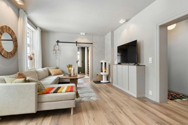 Modern living room with floor transition strip details