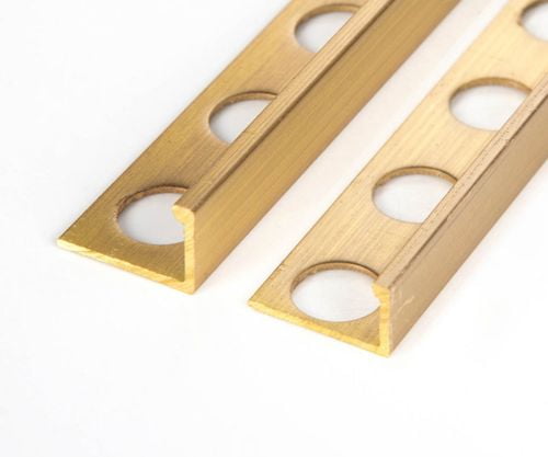 Brushed brass tile trim finish