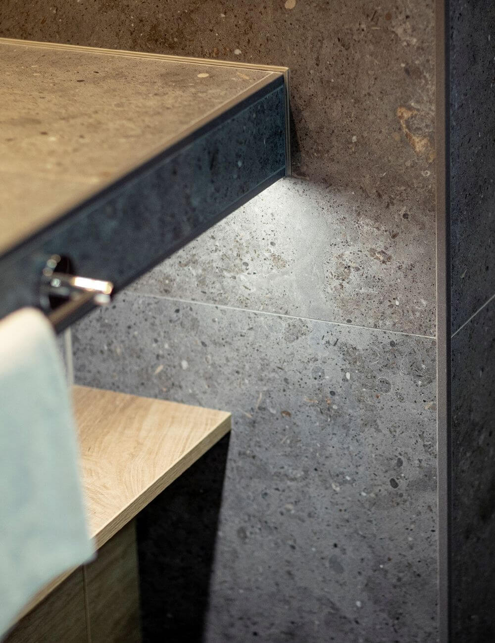 Square edge tile trim finishing an exposed tiled edge
