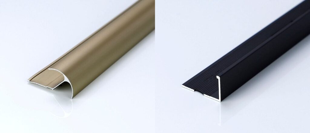 Champagne anodized aluminum tile trim beside matte black aluminum tile trim